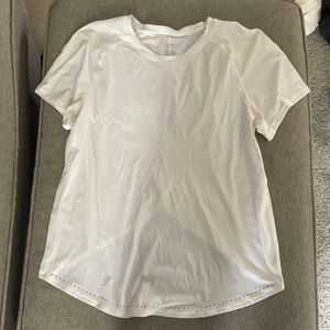 Lululemon top, size 4, triangle cut bottom in the back!!